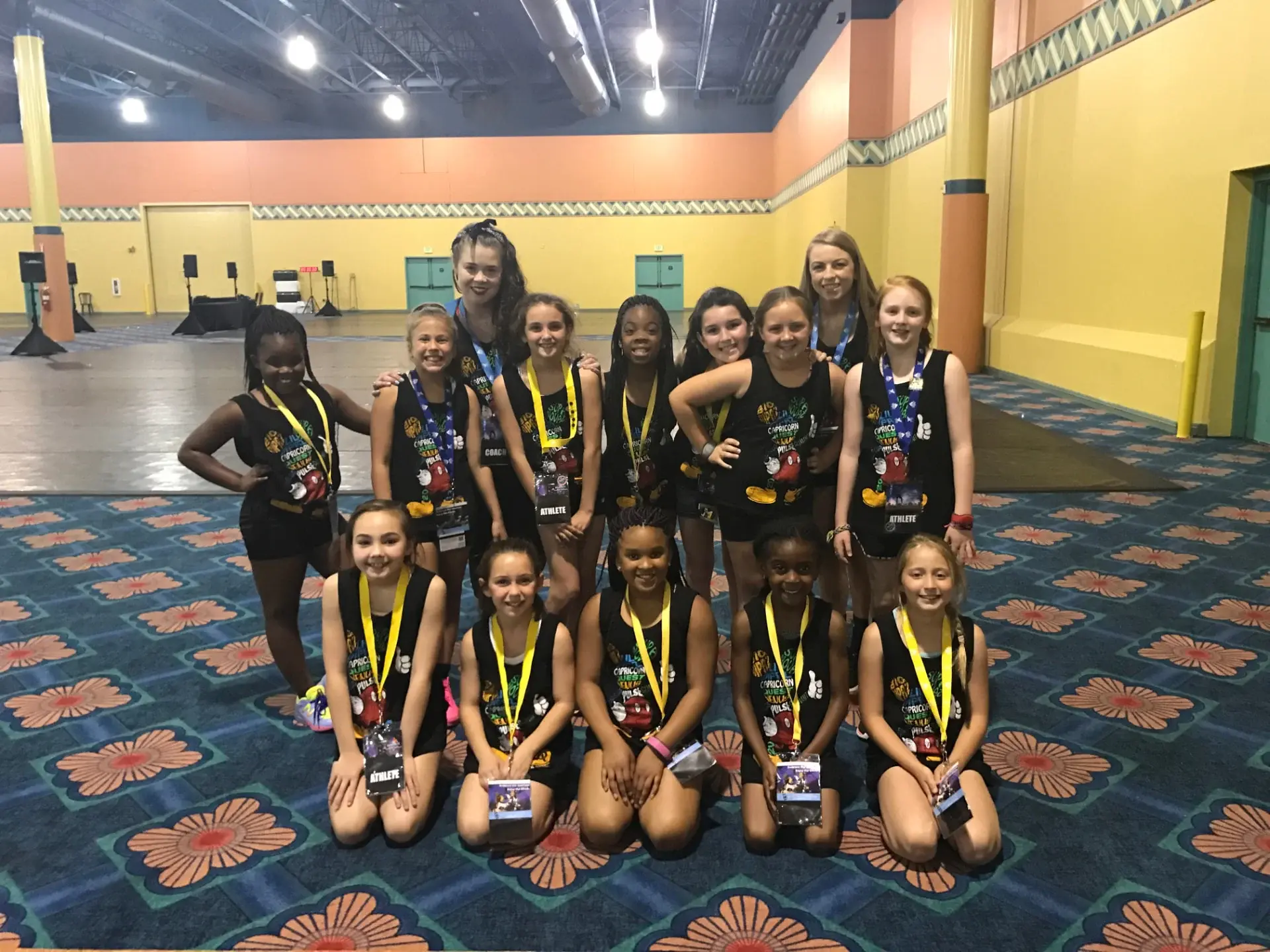 Youth team wearing medals after a competition