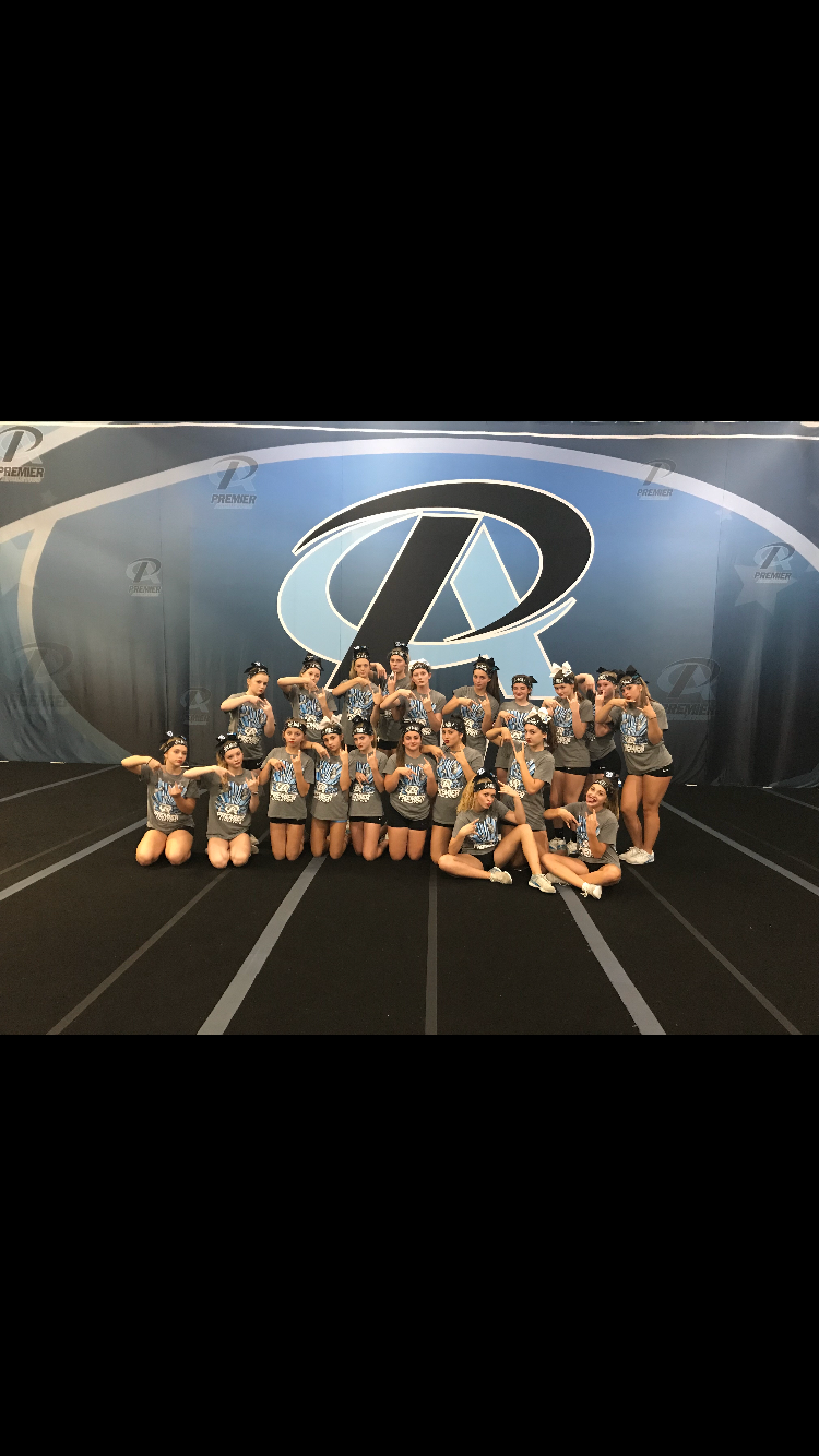 Summit senior team posed on the competition floor