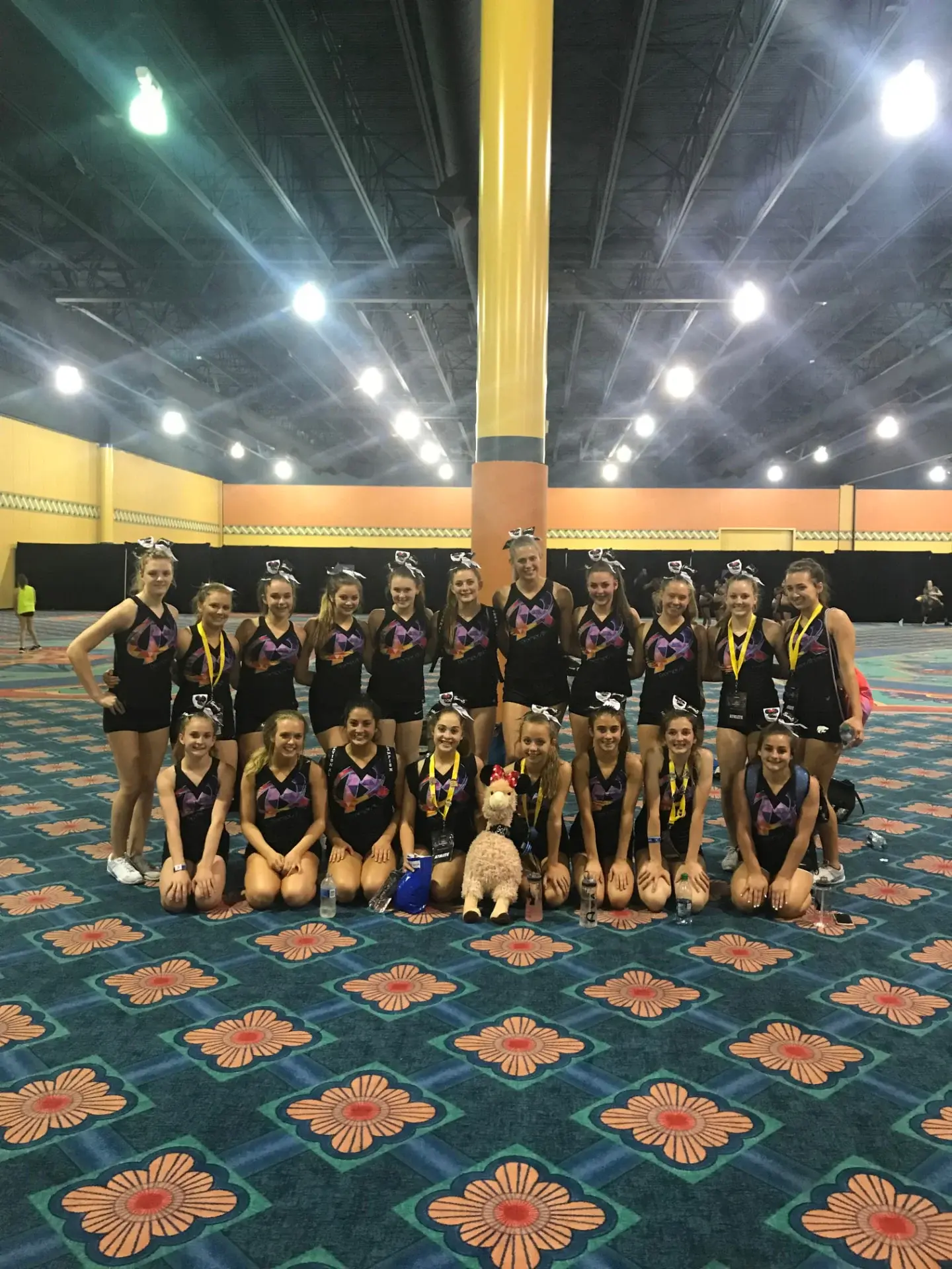Dance company posed together at a national event